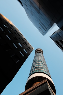 Looking up at a tall building in a city