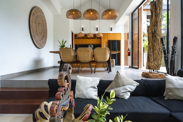 A living room filled with furniture and lots of windows