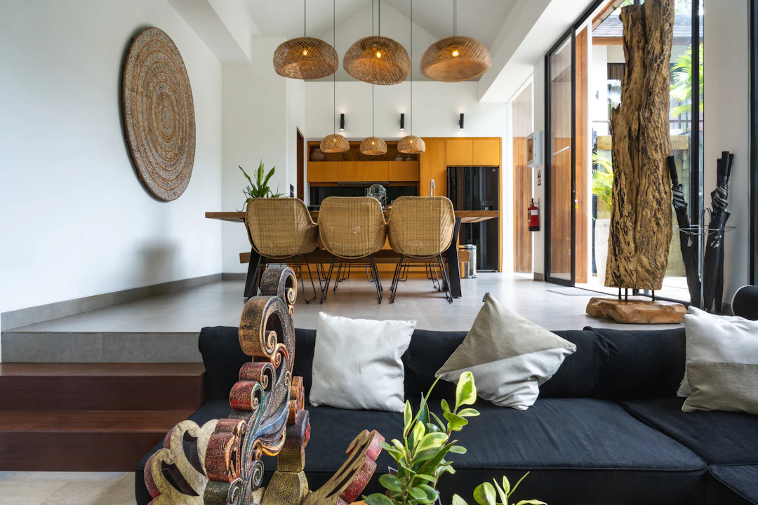 An open dining and lounge area with tall windows