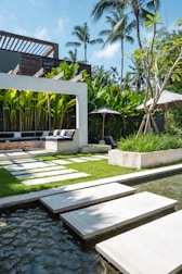 A modern house with a pool in the middle of it