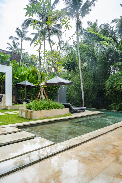 A house with a pool in the middle of it
