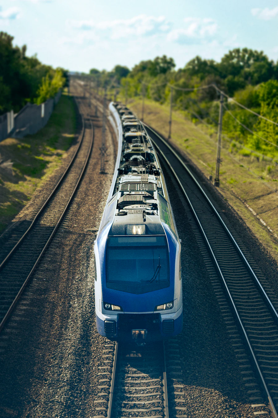 Passenger train traveling through a scenic landscape