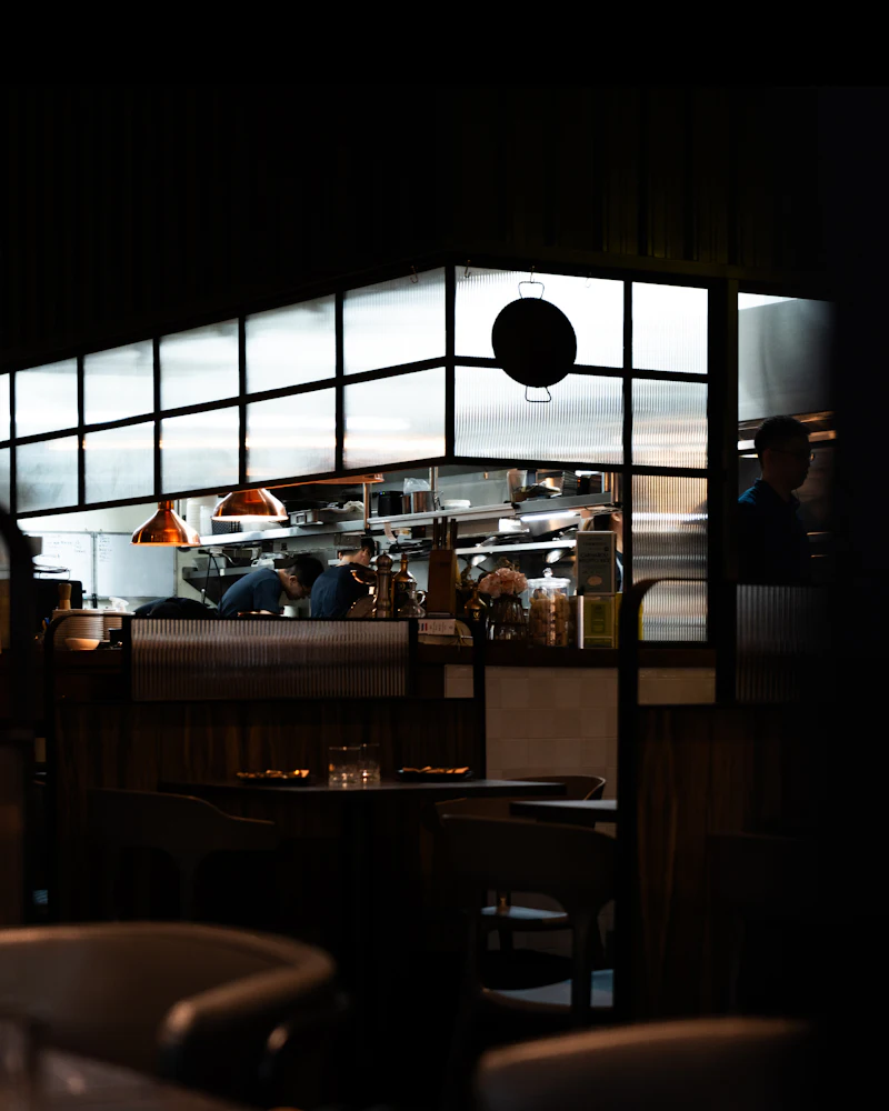 Dimly lit restaurant counter seating