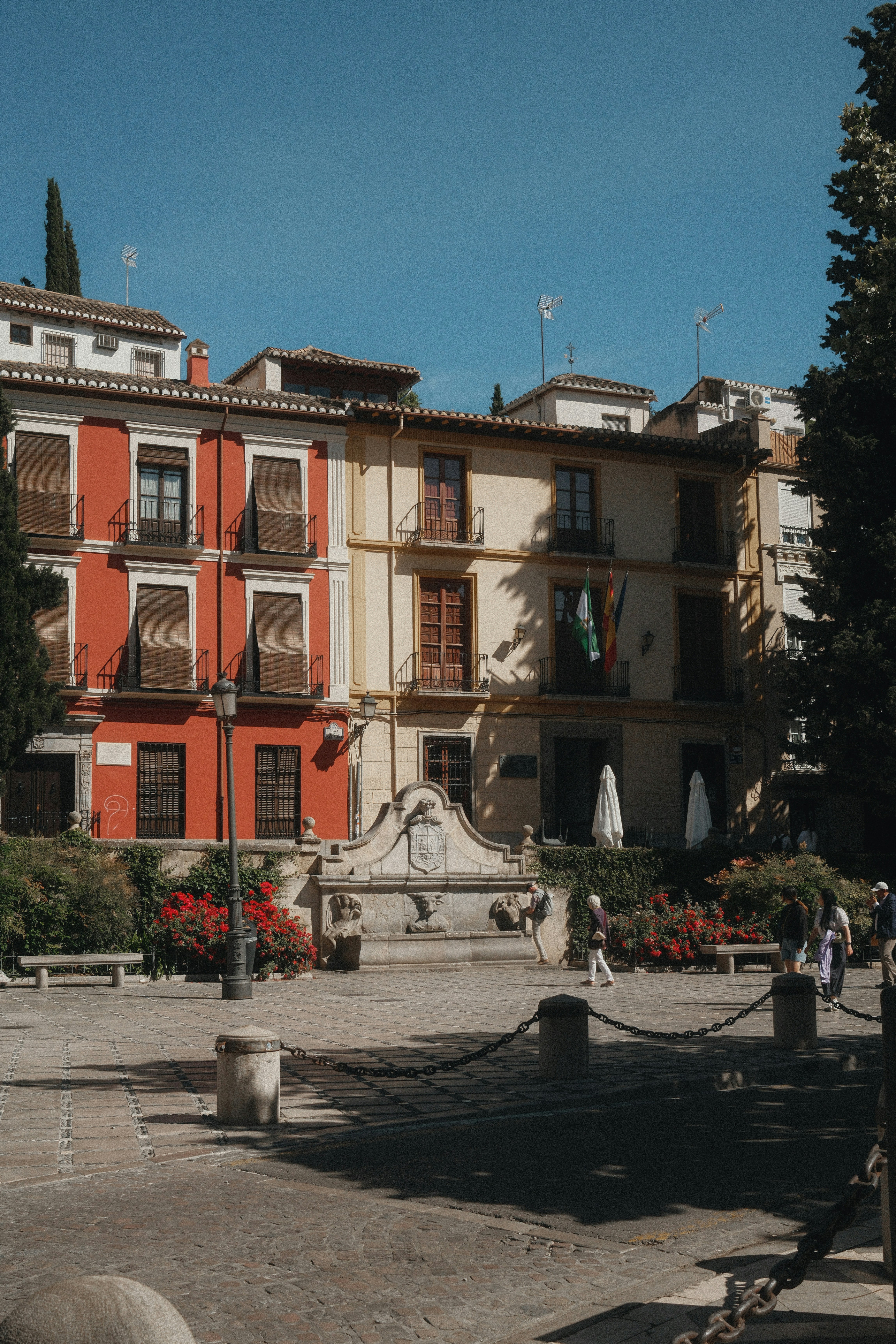 A building with a fountain in front of it