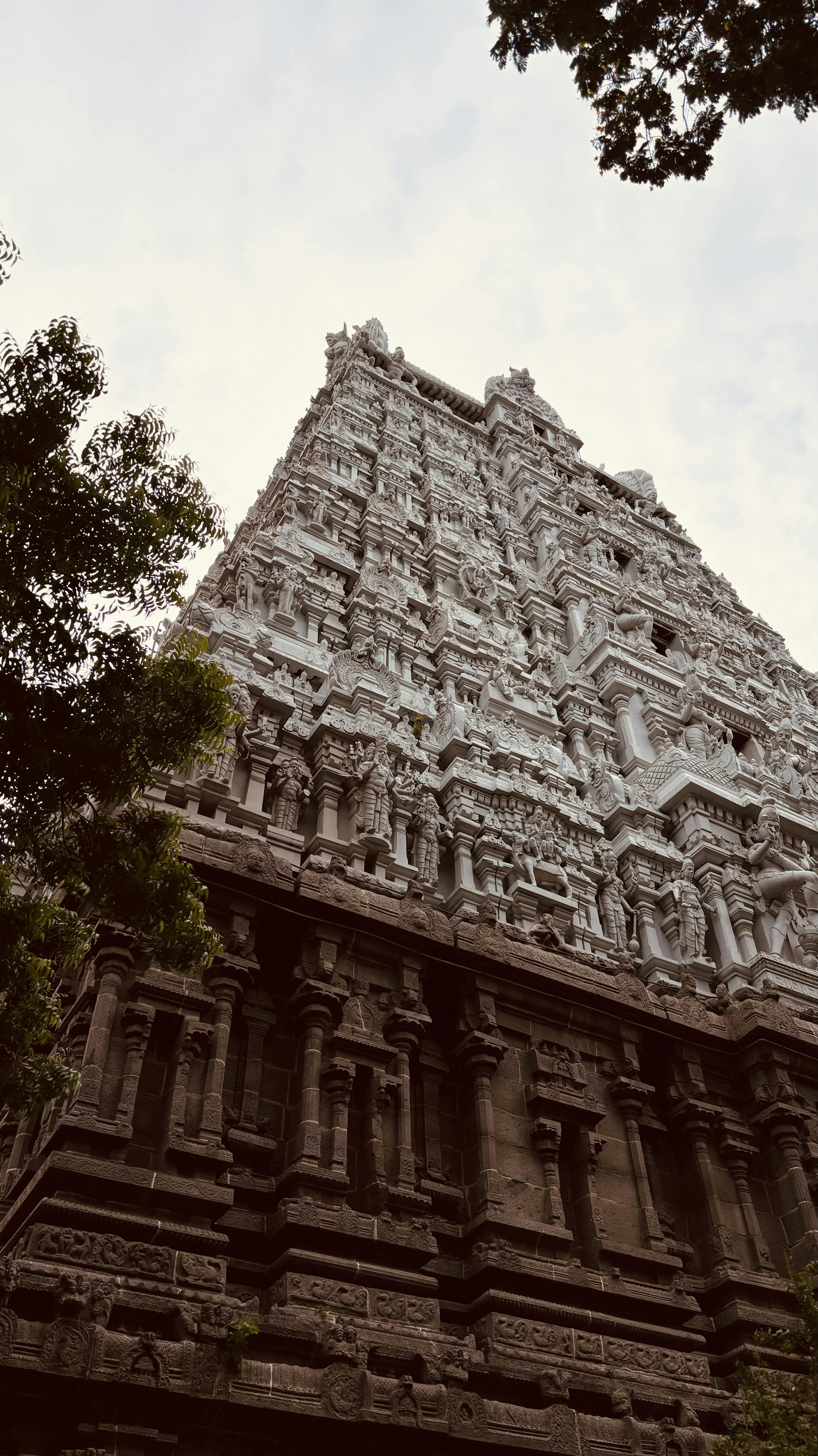 A very tall building with a lot of carvings on it