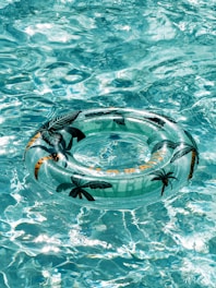 A life preserver floating in a pool of water