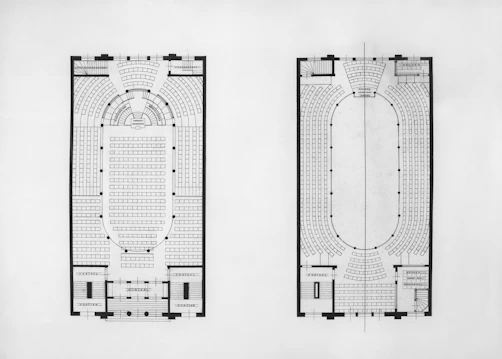 Two architectural floor plans of an oval-shaped building