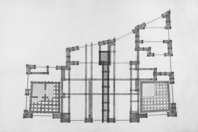 A black and white photo of a plan of a building
