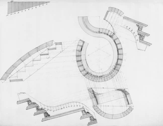 Architectural drawings of curved stairs and structures