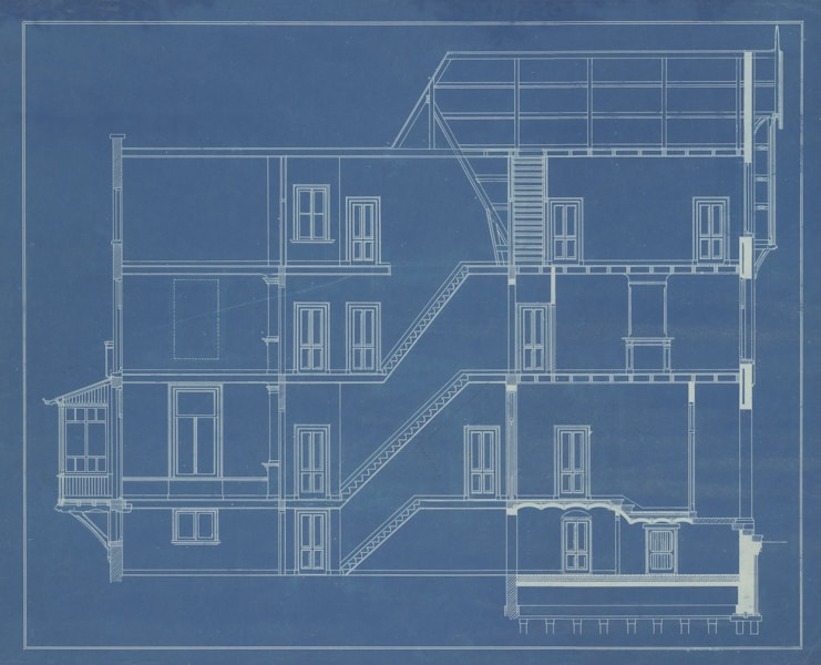 An architectural blueprint of a multi-story building, representing a pinned API contract checked before every integration change