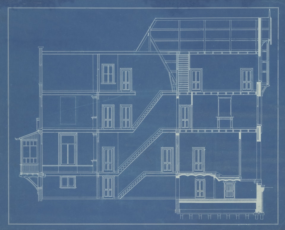 An architectural blueprint showing the cross-section of a multi-story building