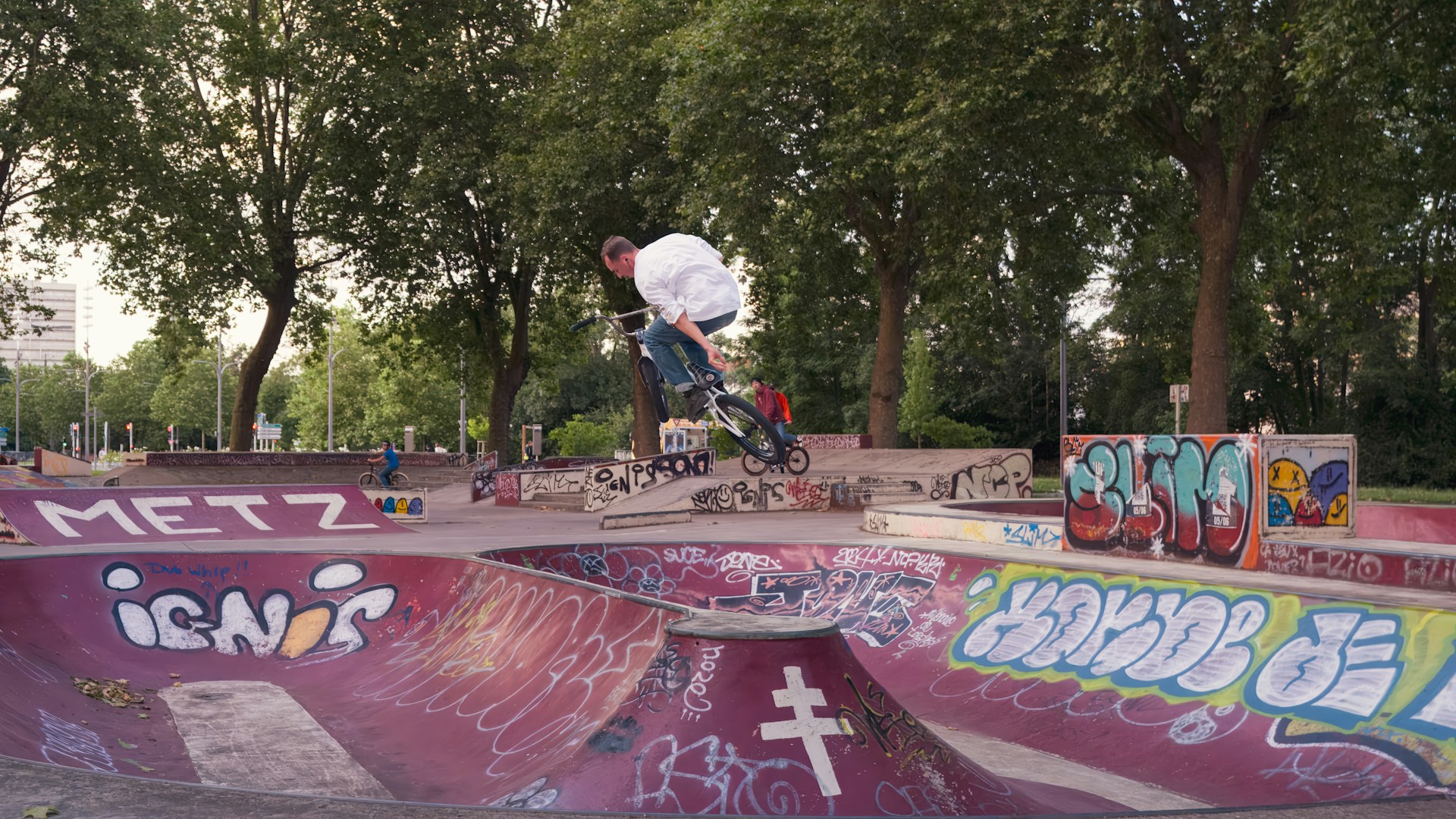 A man riding a skateboard up the side of a ramp