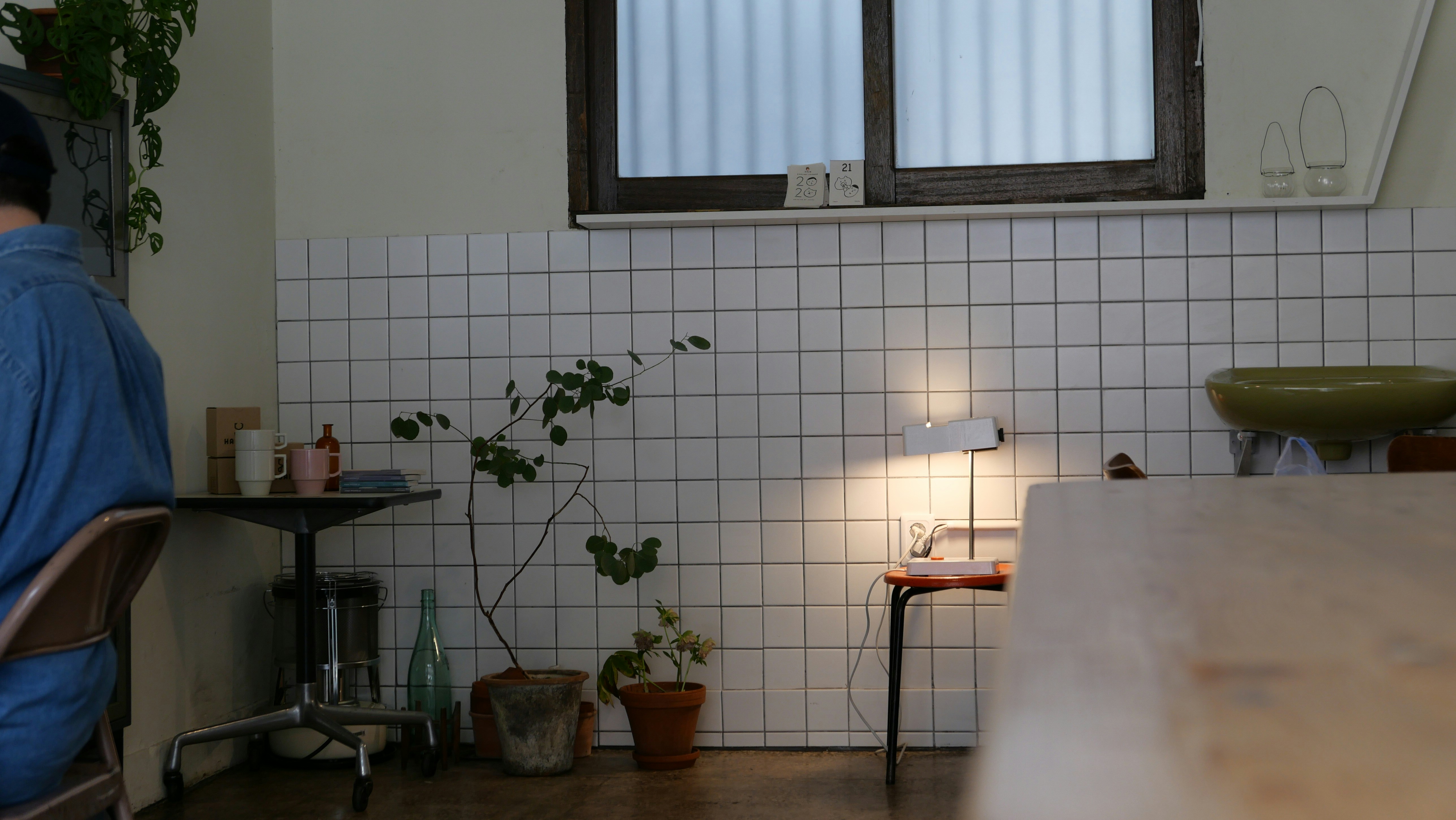 A person sitting in a chair in a room