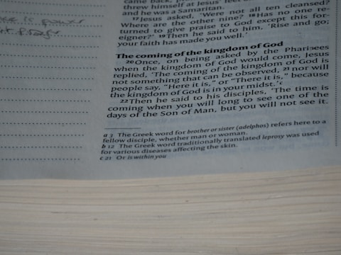 A close up of a book with writing on it