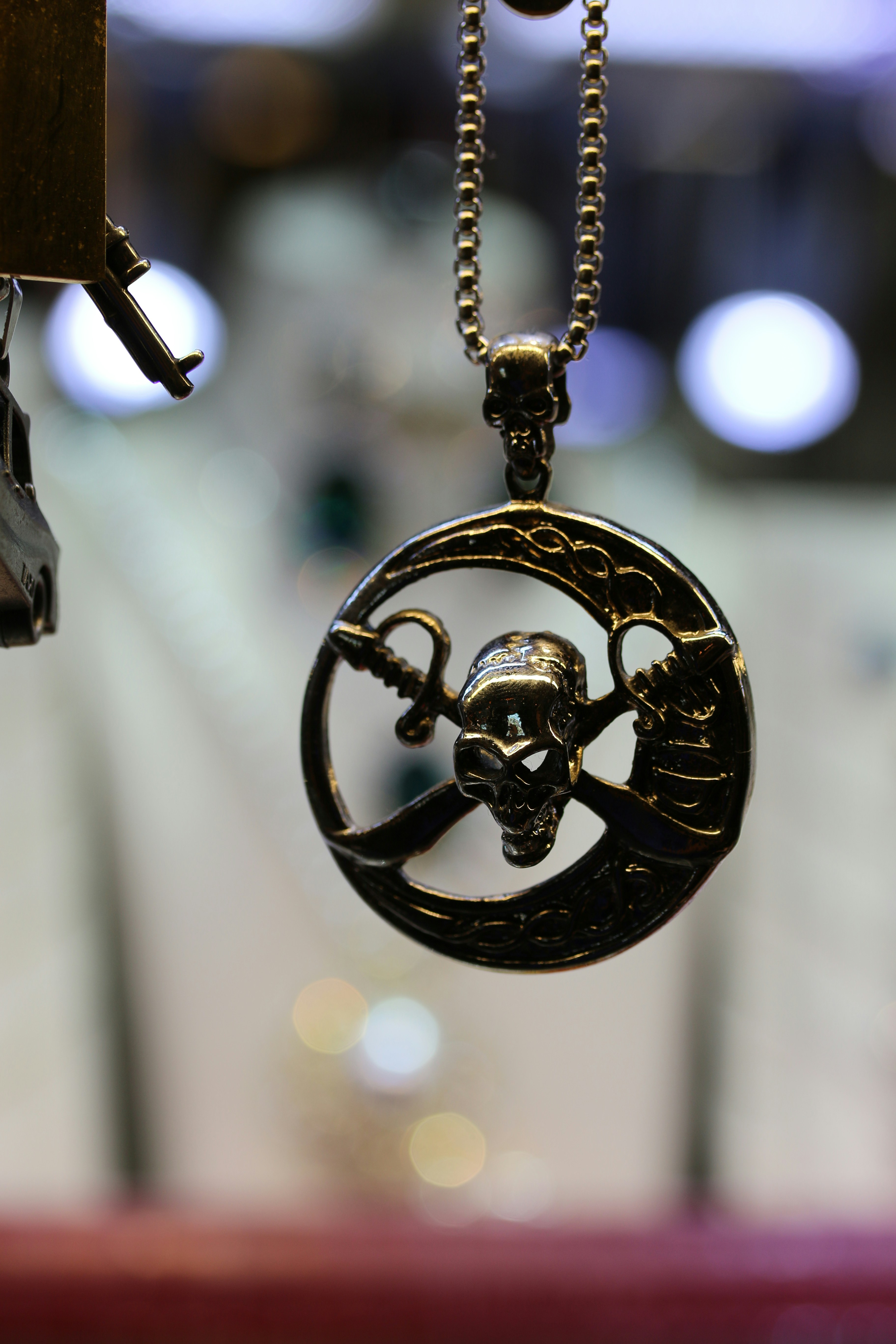 A couple of necklaces hanging from a hook