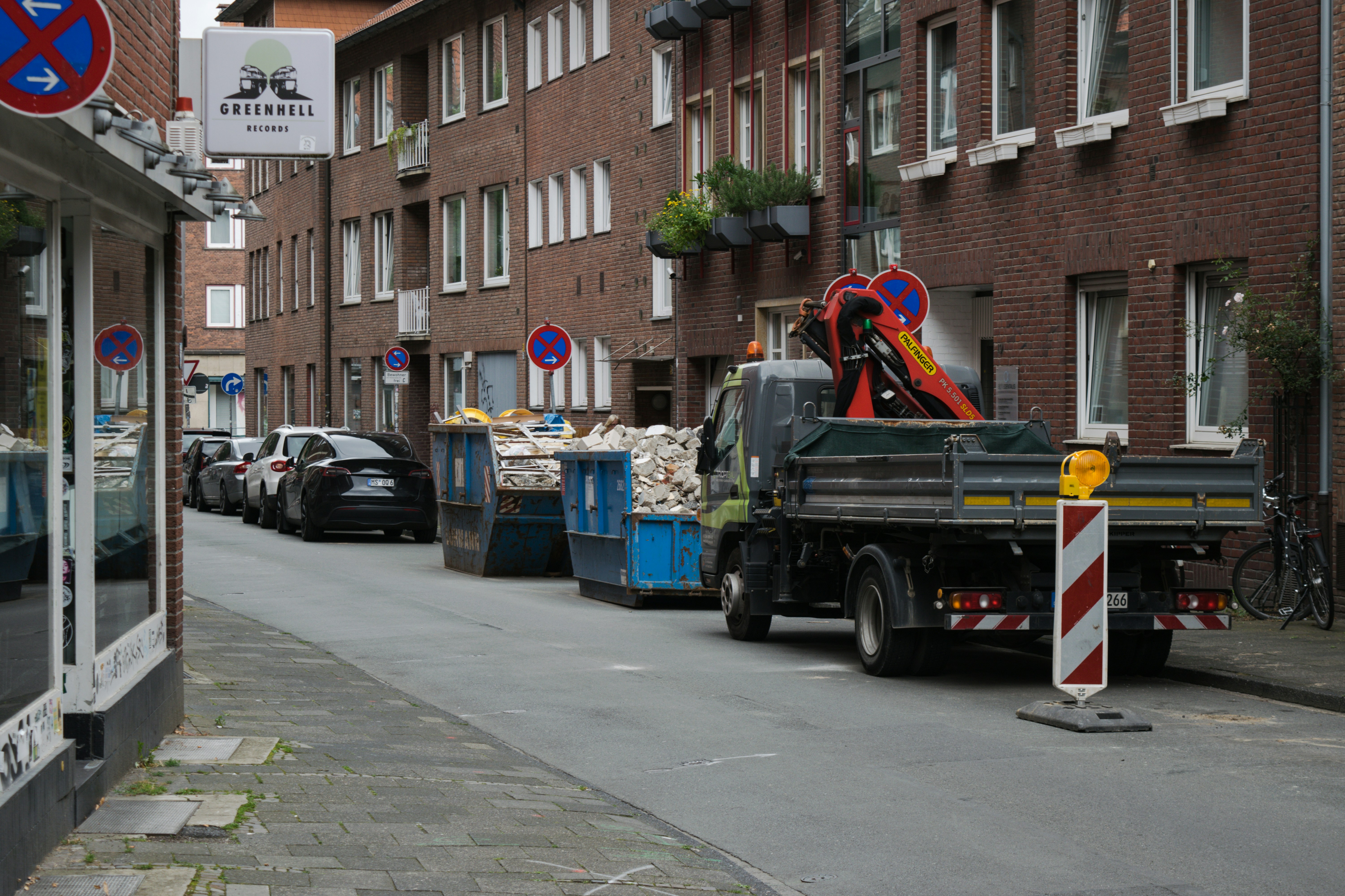 A truck is parked on the side of the road