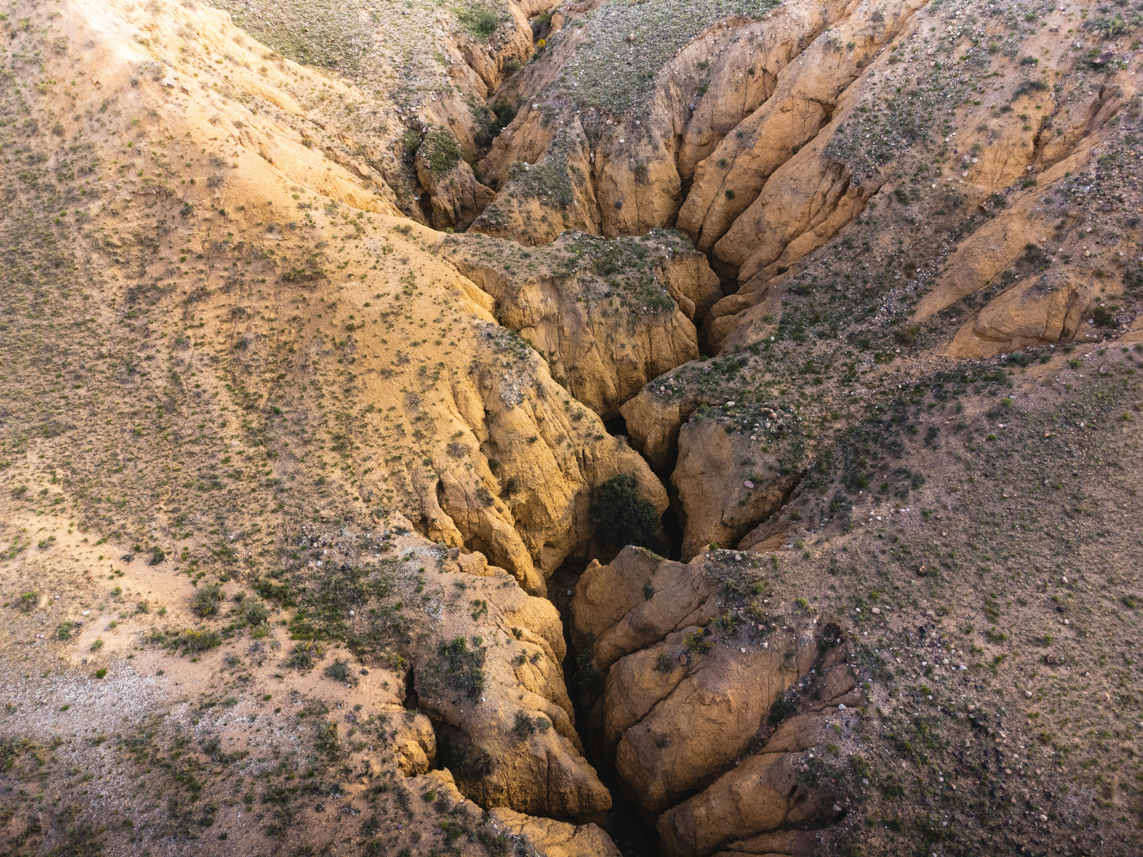 A large crack in the side of a mountain