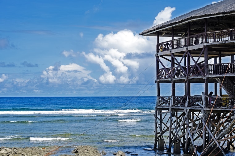 A view of the ocean from the shore of a beach