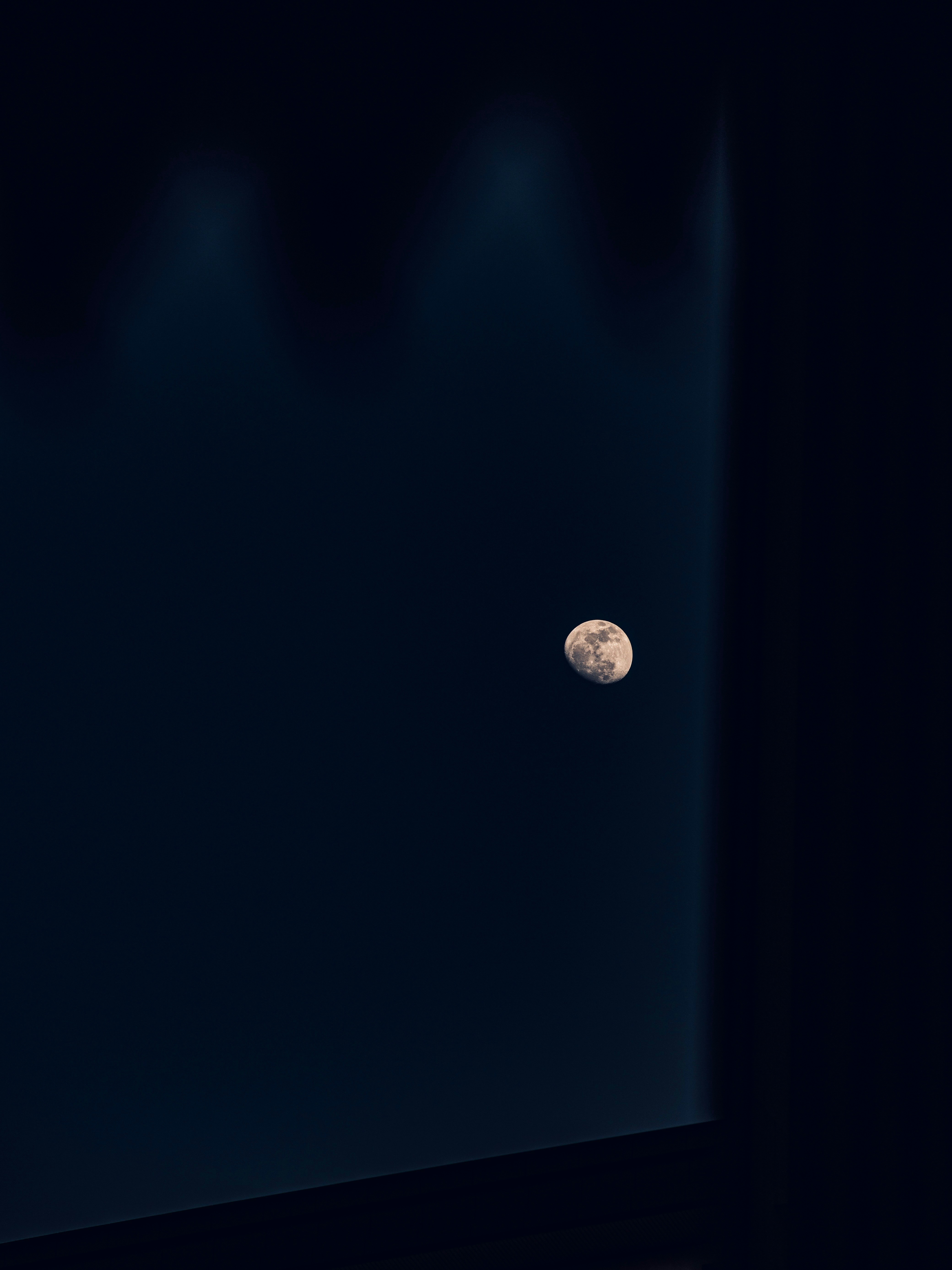 A view of the moon through a window photo – Free Moon Image on Unsplash