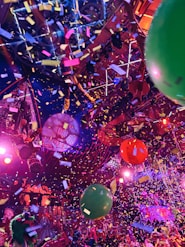 A bunch of balloons that are in the air