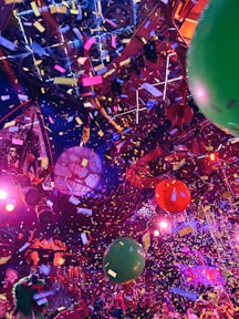 A bunch of balloons that are in the air