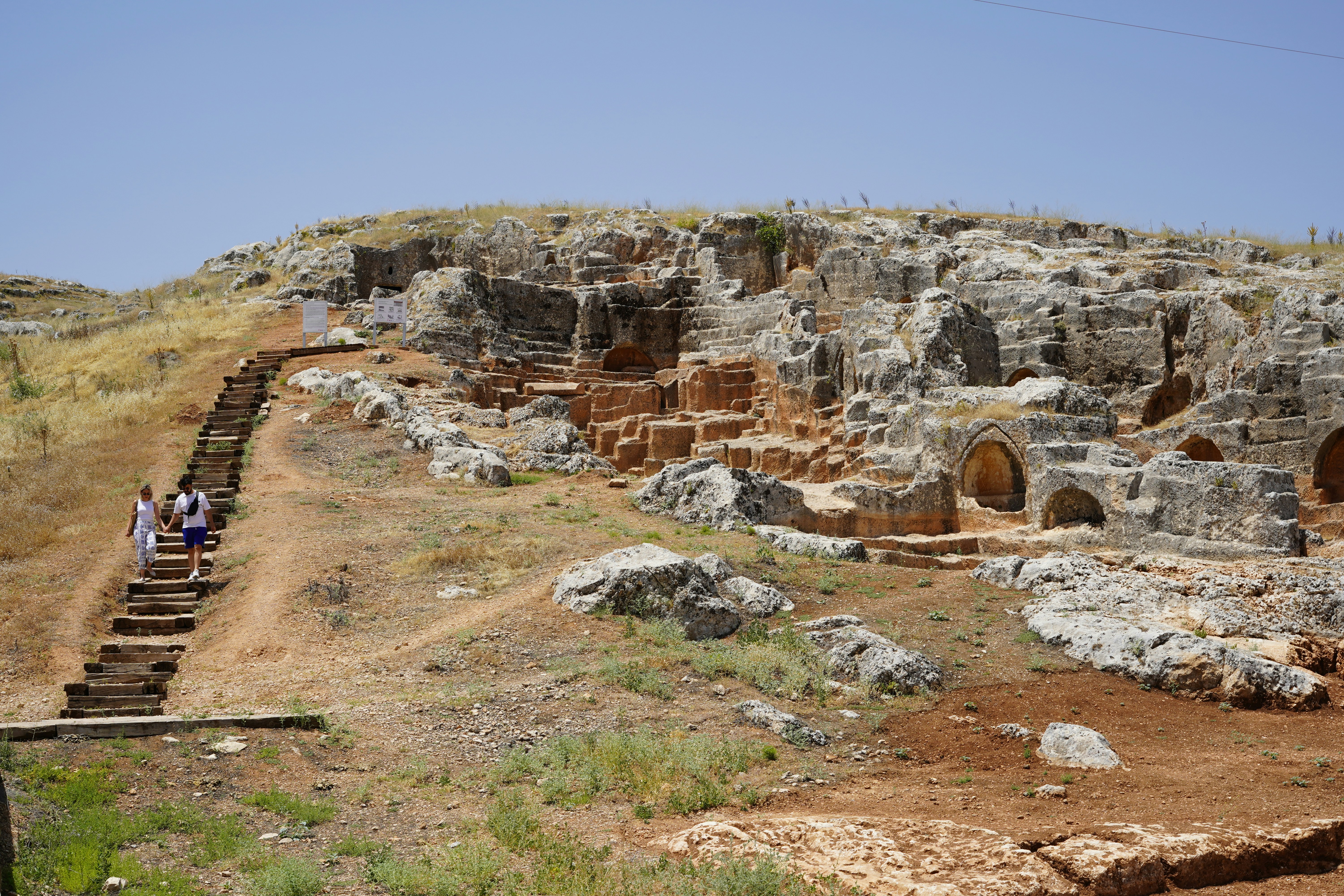 A group of people walking up some steps