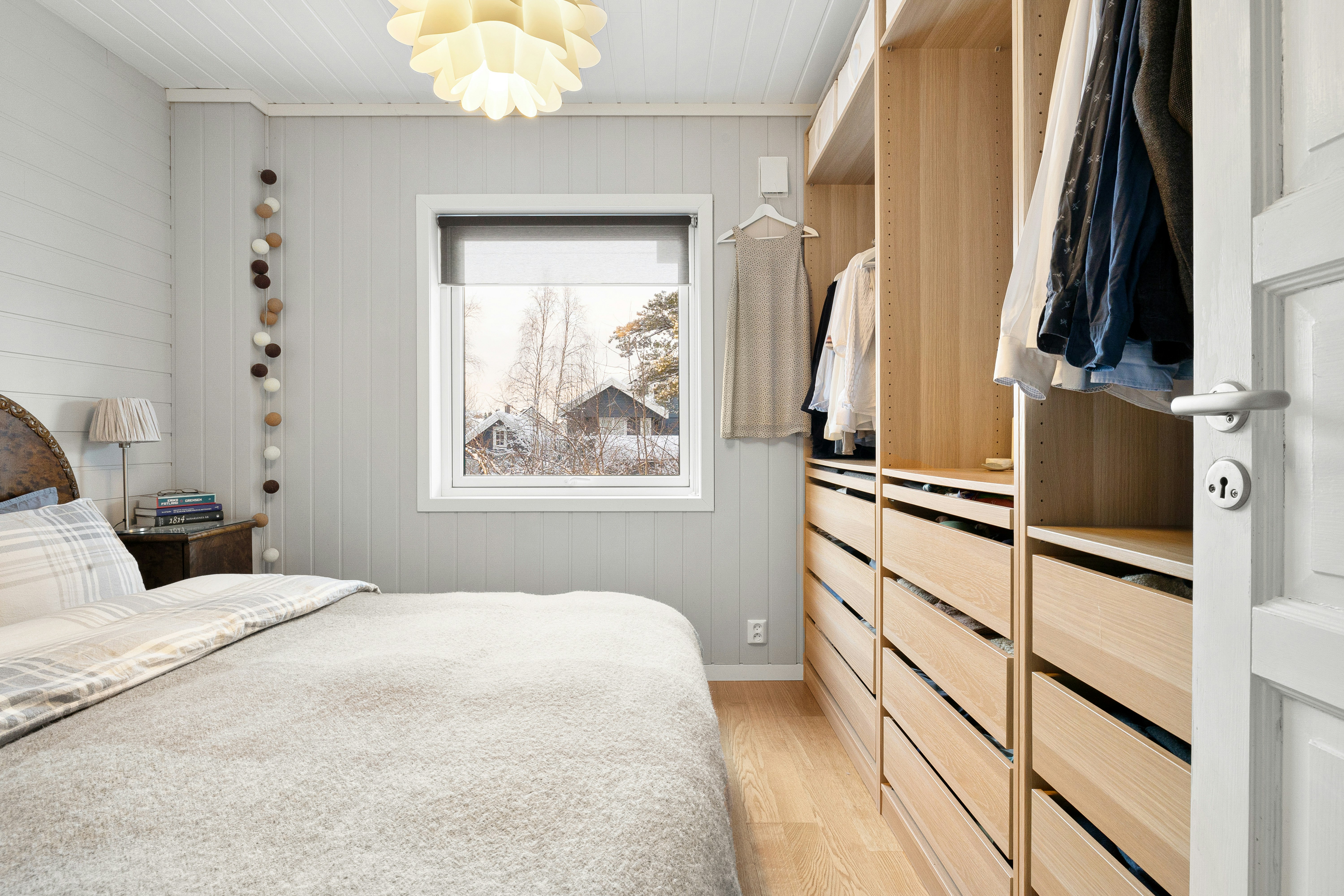 1 BHK bedroom with clever storage solutions like under-bed drawers - 1 bhk unit plan