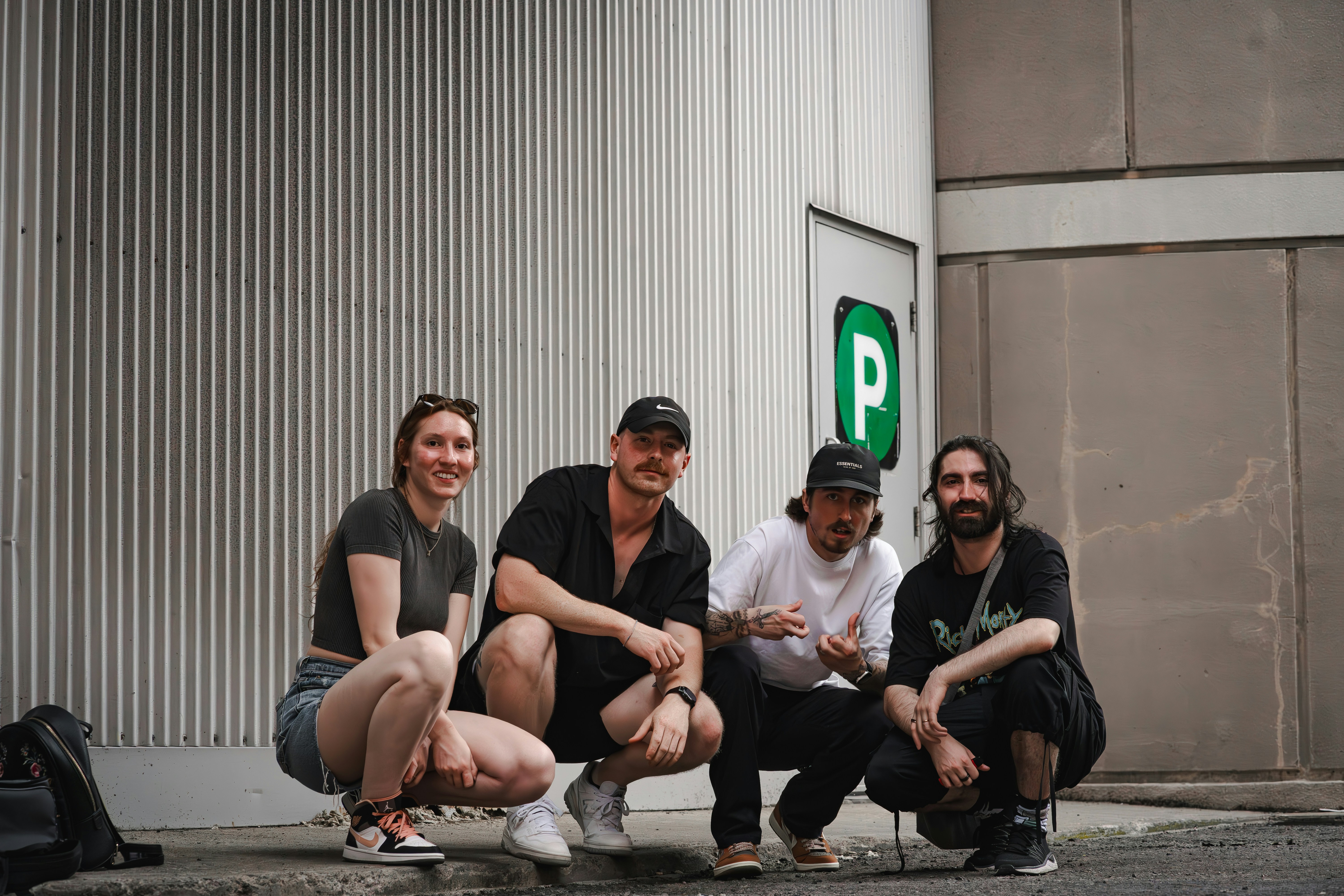A group of people sitting next to each other