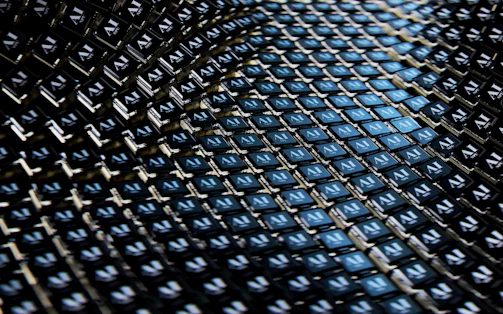 A close up view of a blue and black fabric
