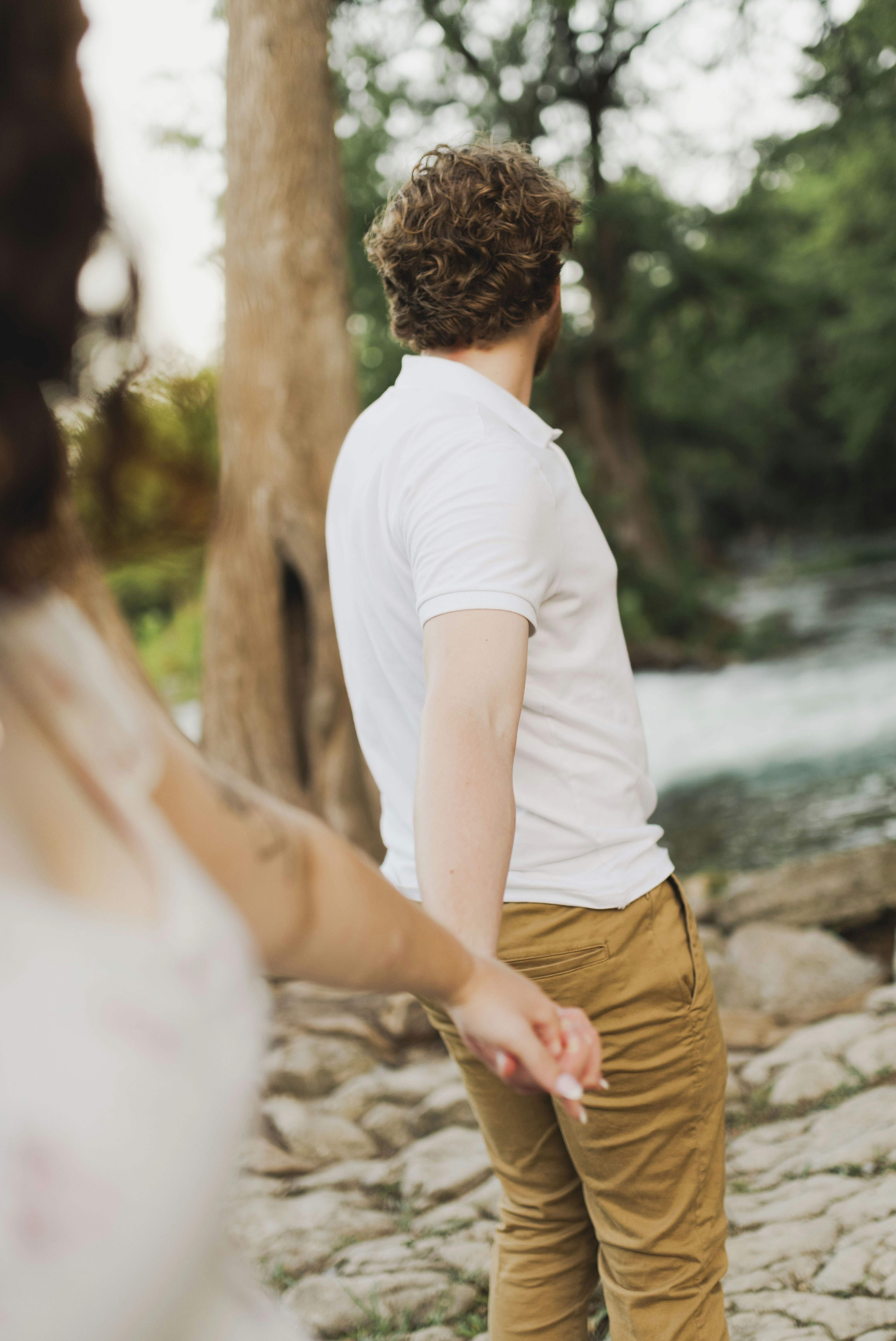 A man and a woman standing next to each other