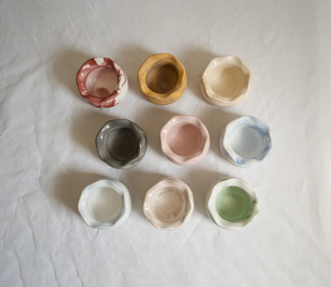 Small hand-pinched bowls, each one different