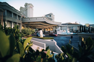 A large building with a boat in front of it