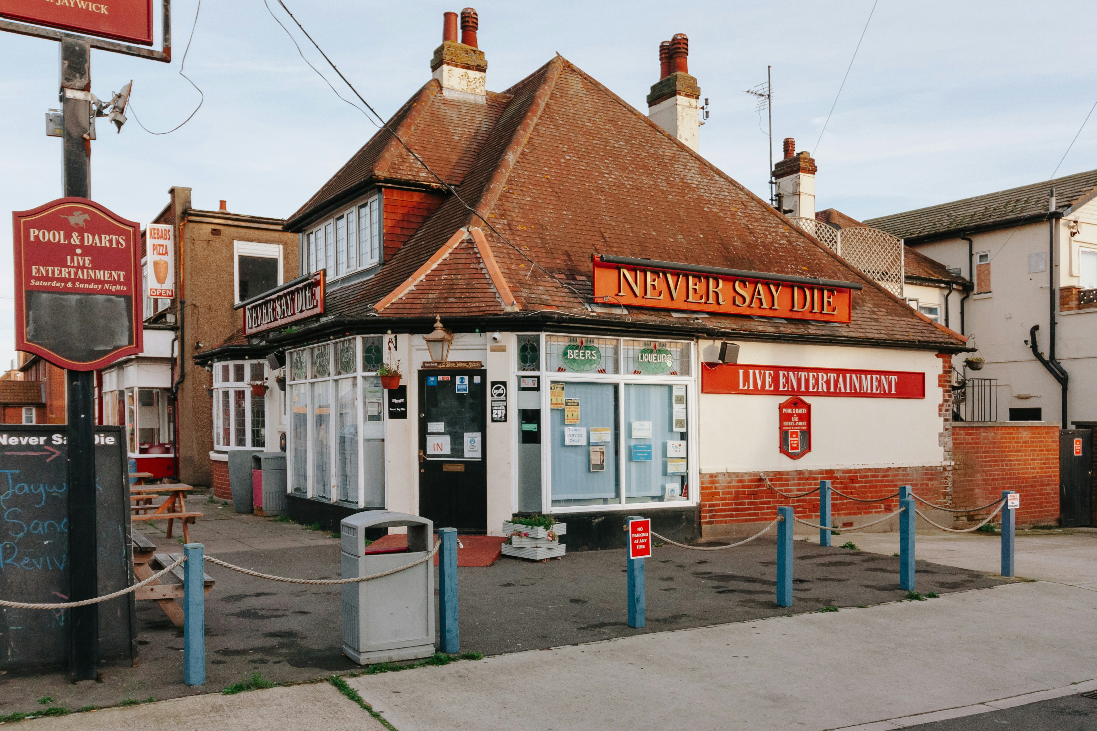 A building with a sign on the front of it