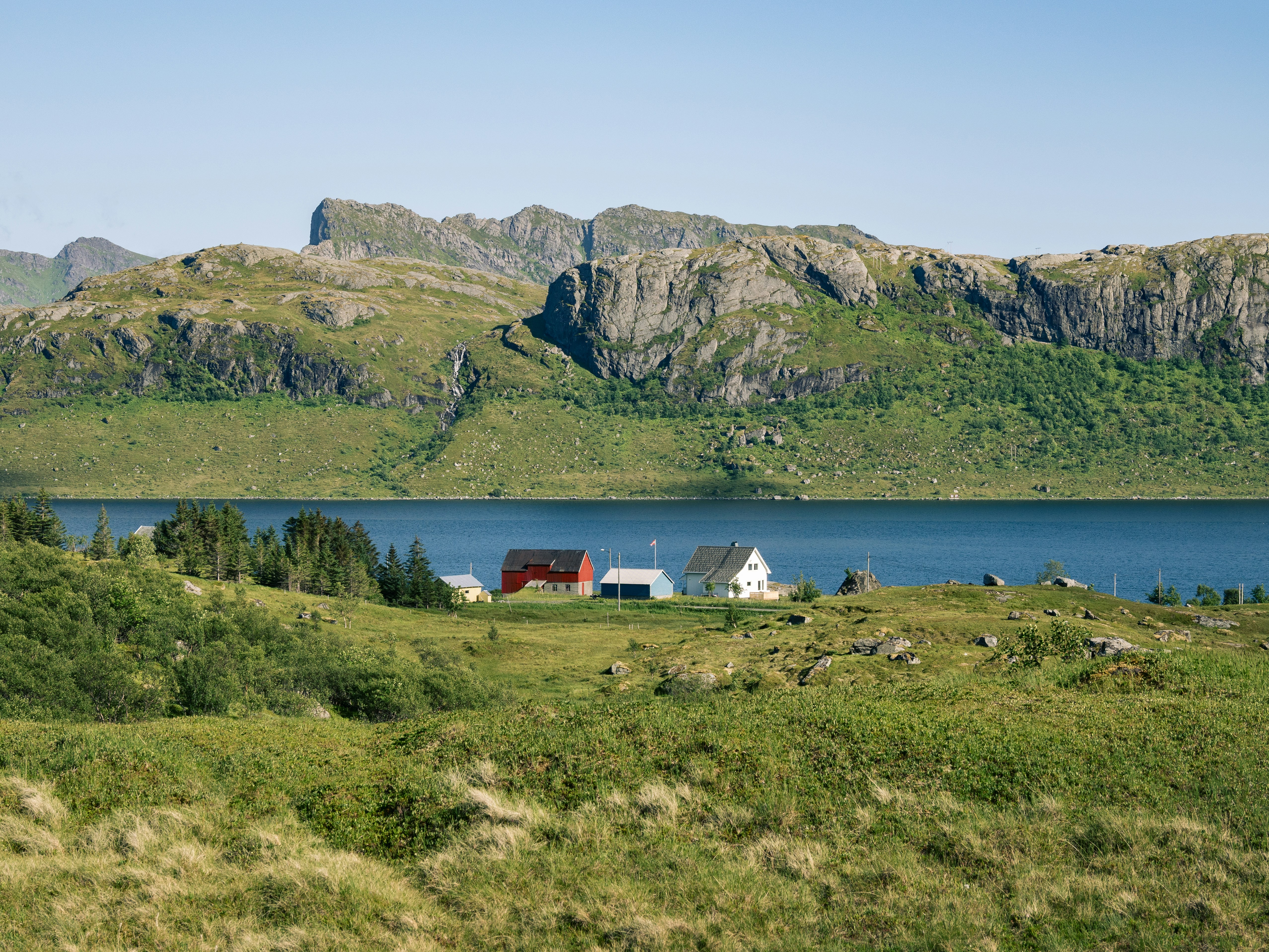A large body of water surrounded by mountains