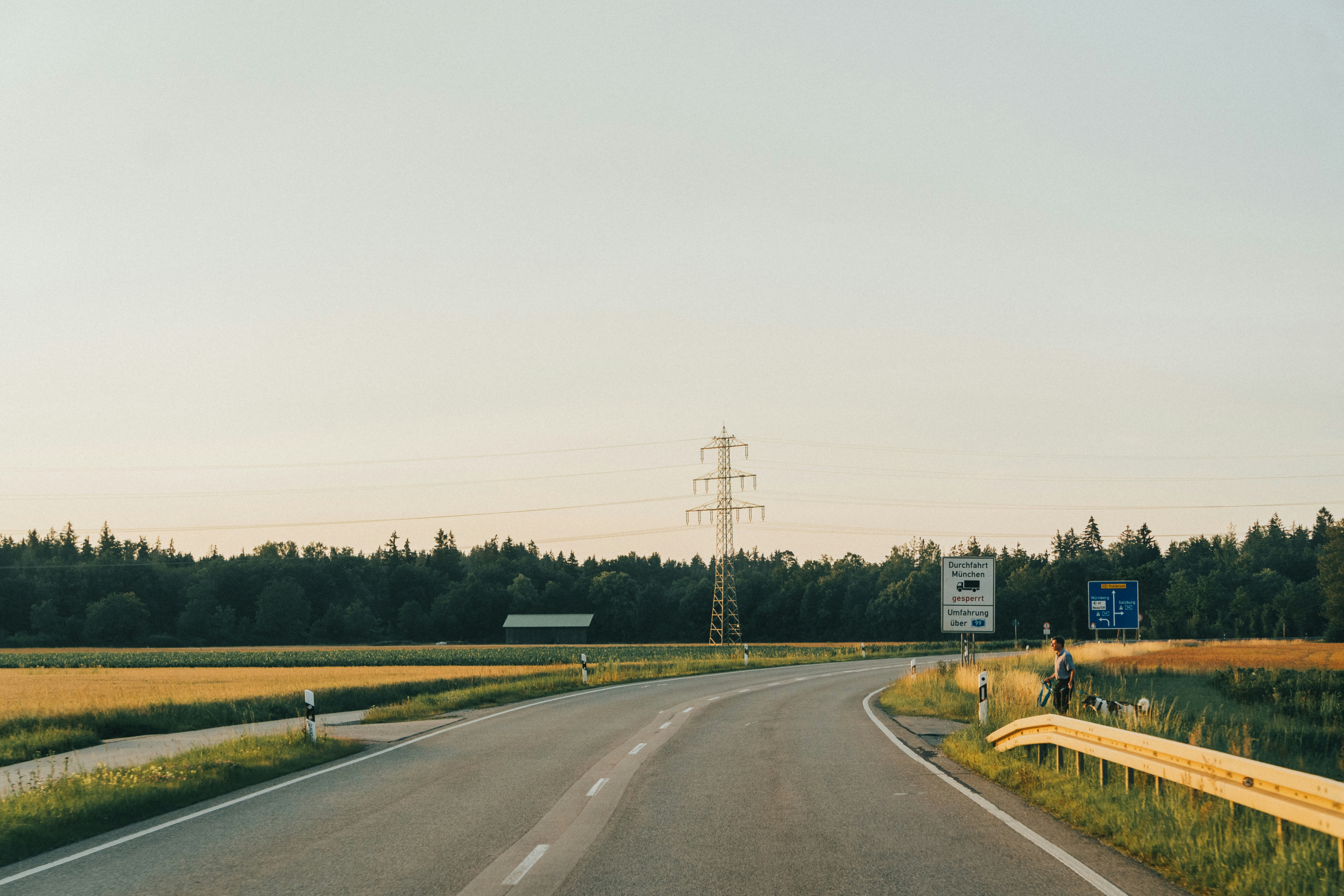 Family SUV cruising down the highway during a road trip