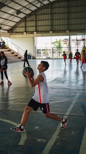 A group of people playing a game of frisbee