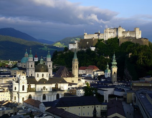 A view of a city with a castle in the background — Salzburg, Austria