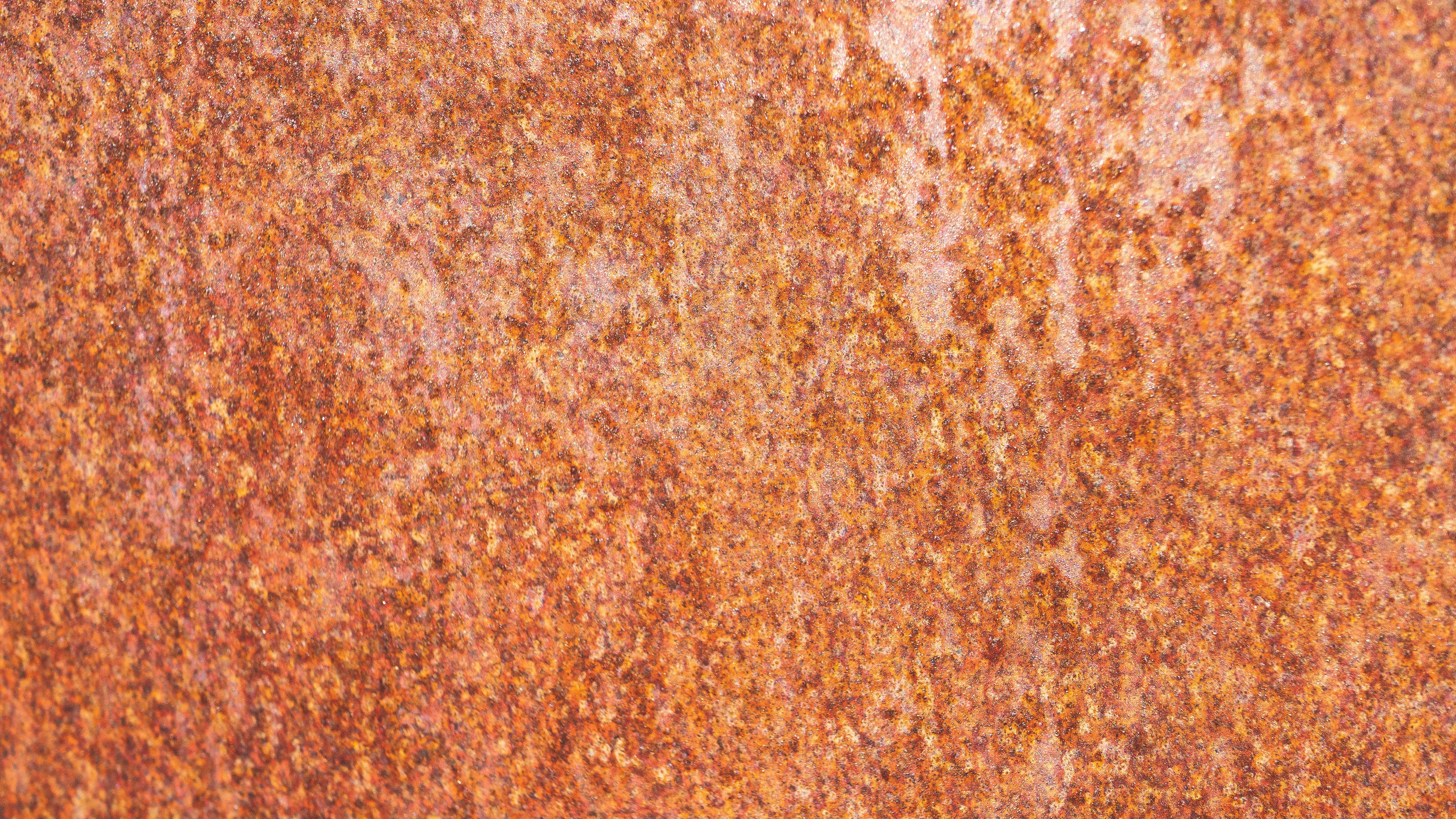 A close up of a rusted metal surface