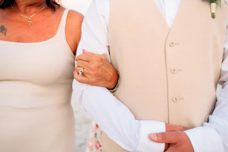 A man and a woman standing next to each other