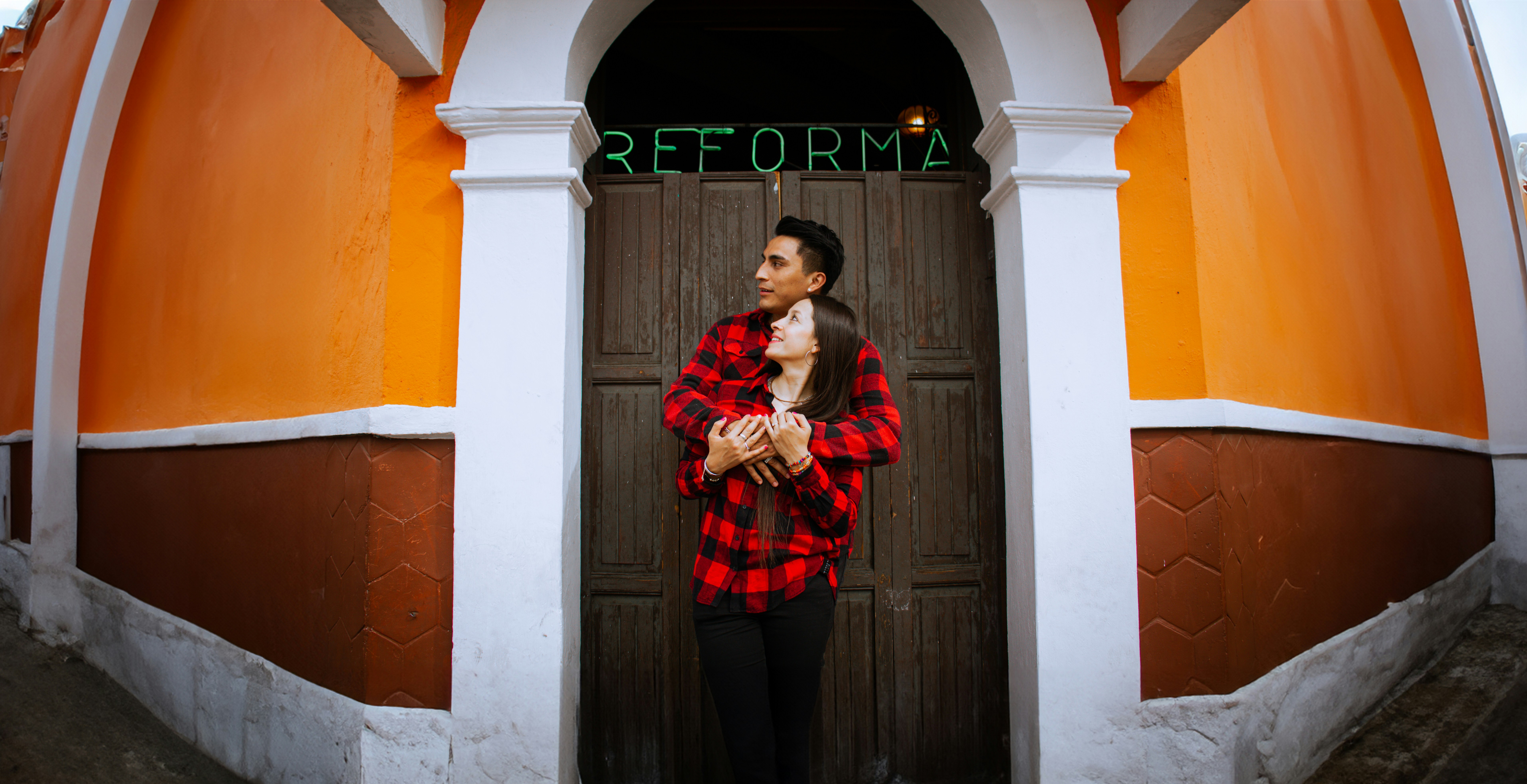 A man standing in front of a doorway