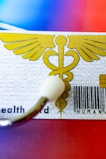 A close up of a medical id tag on a table