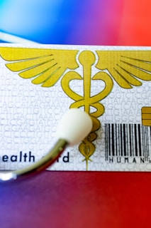 A close up of a medical id tag on a table