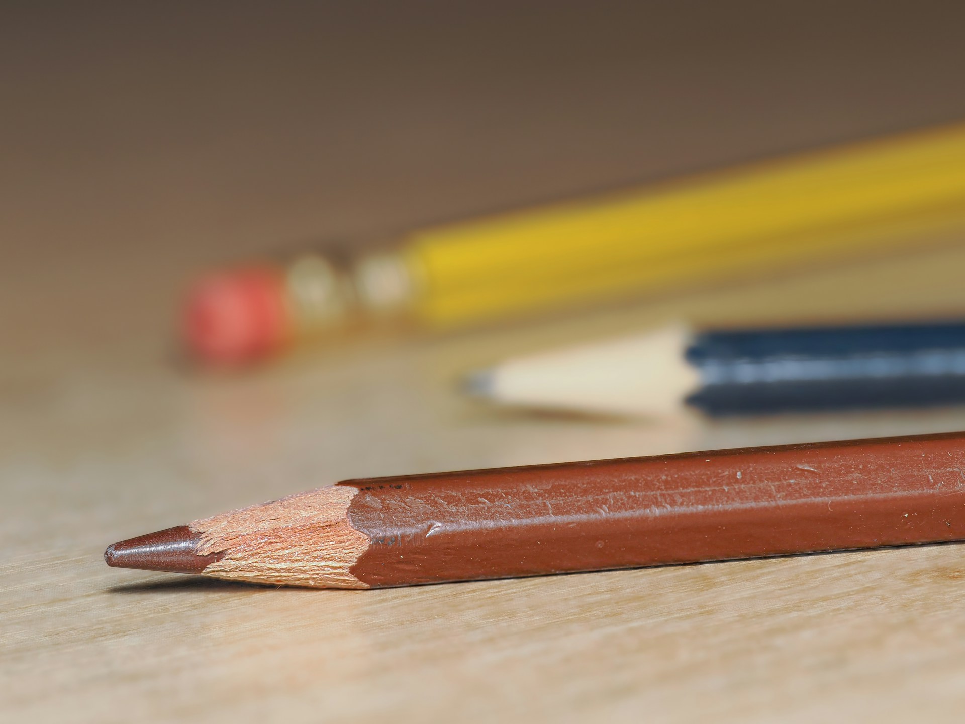 A close up of a pencil and a pencil sharpener