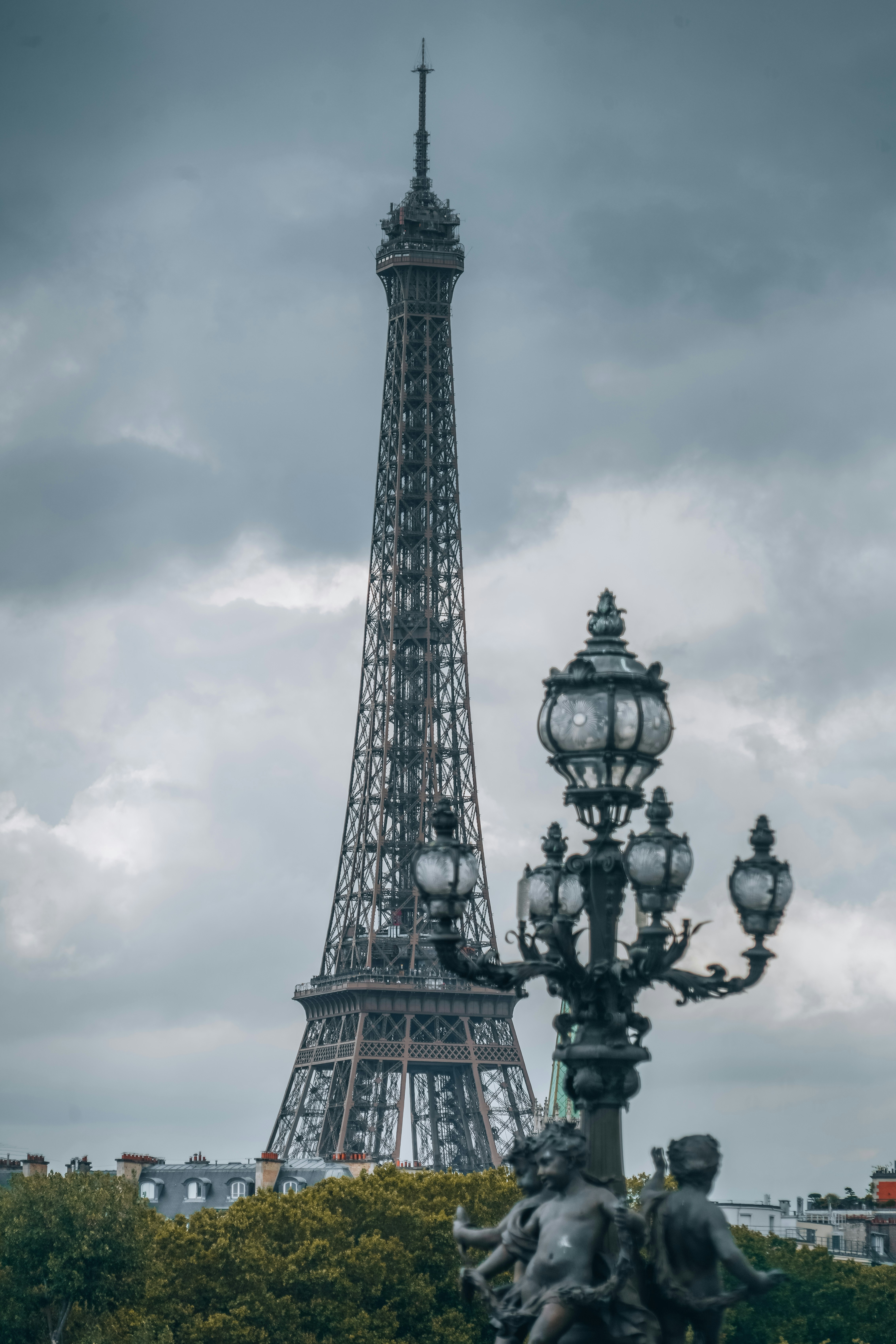 The eiffel tower towering over the city of paris