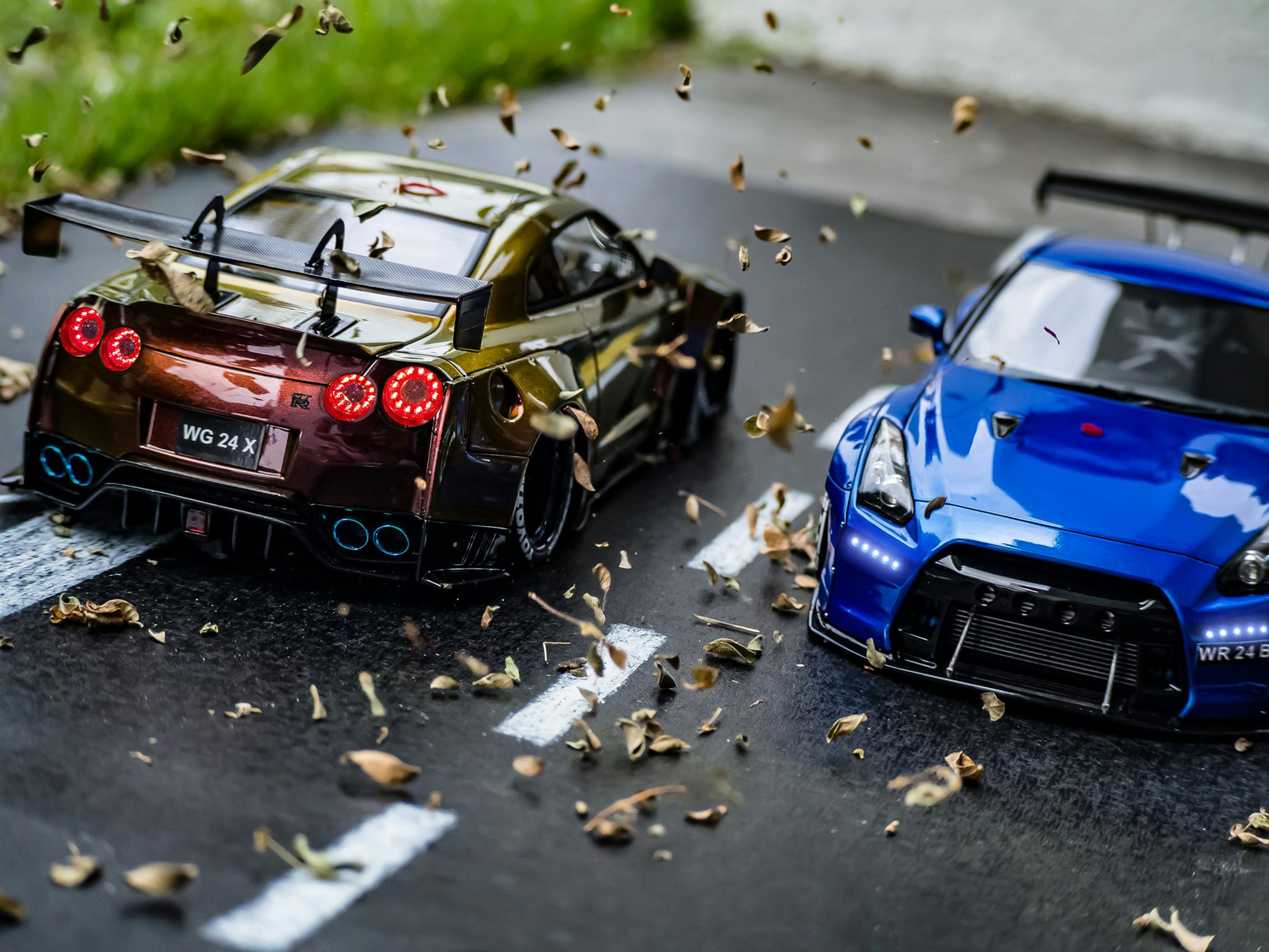 A couple of cars that are on a road