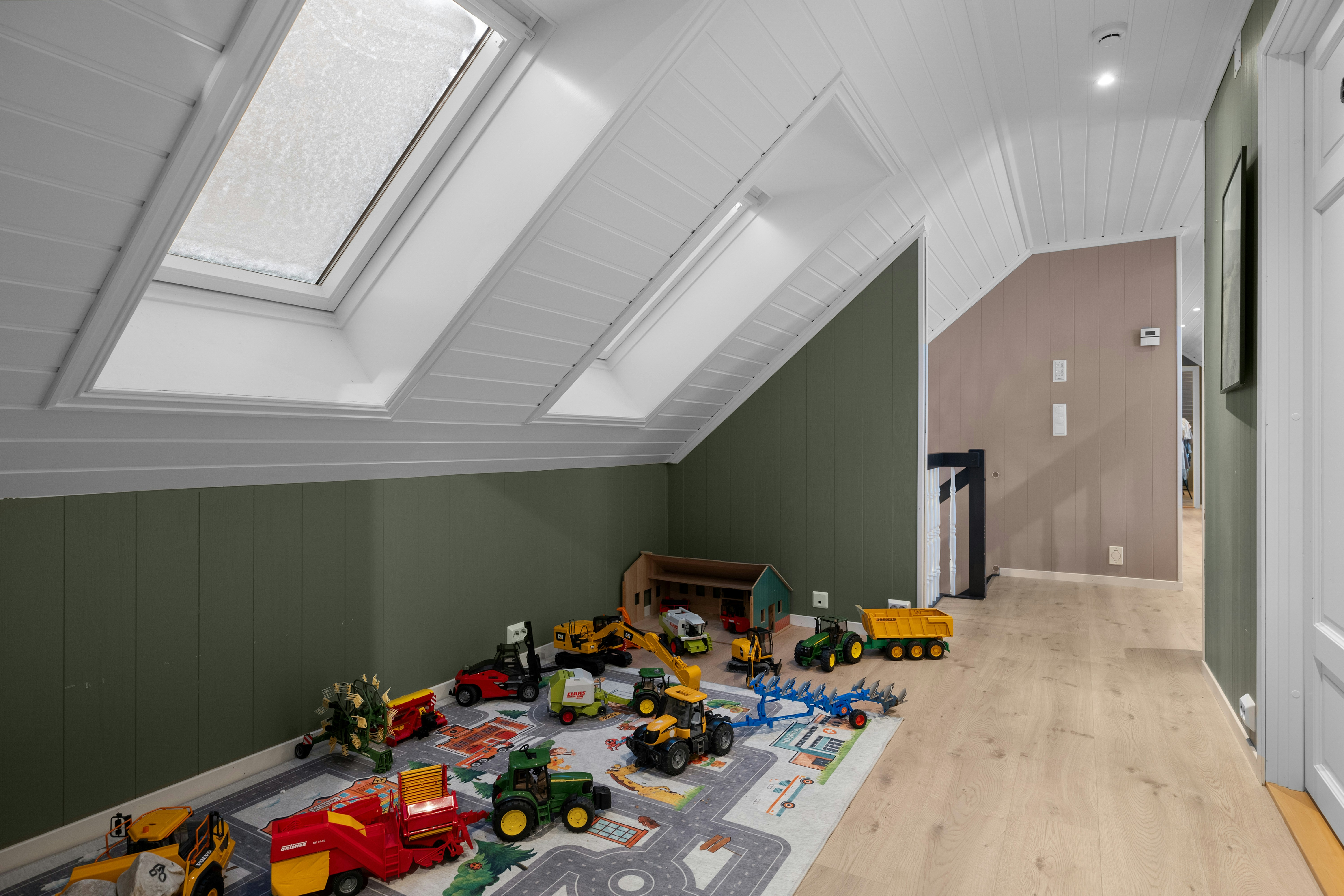 A room with a lot of toys on the floor
