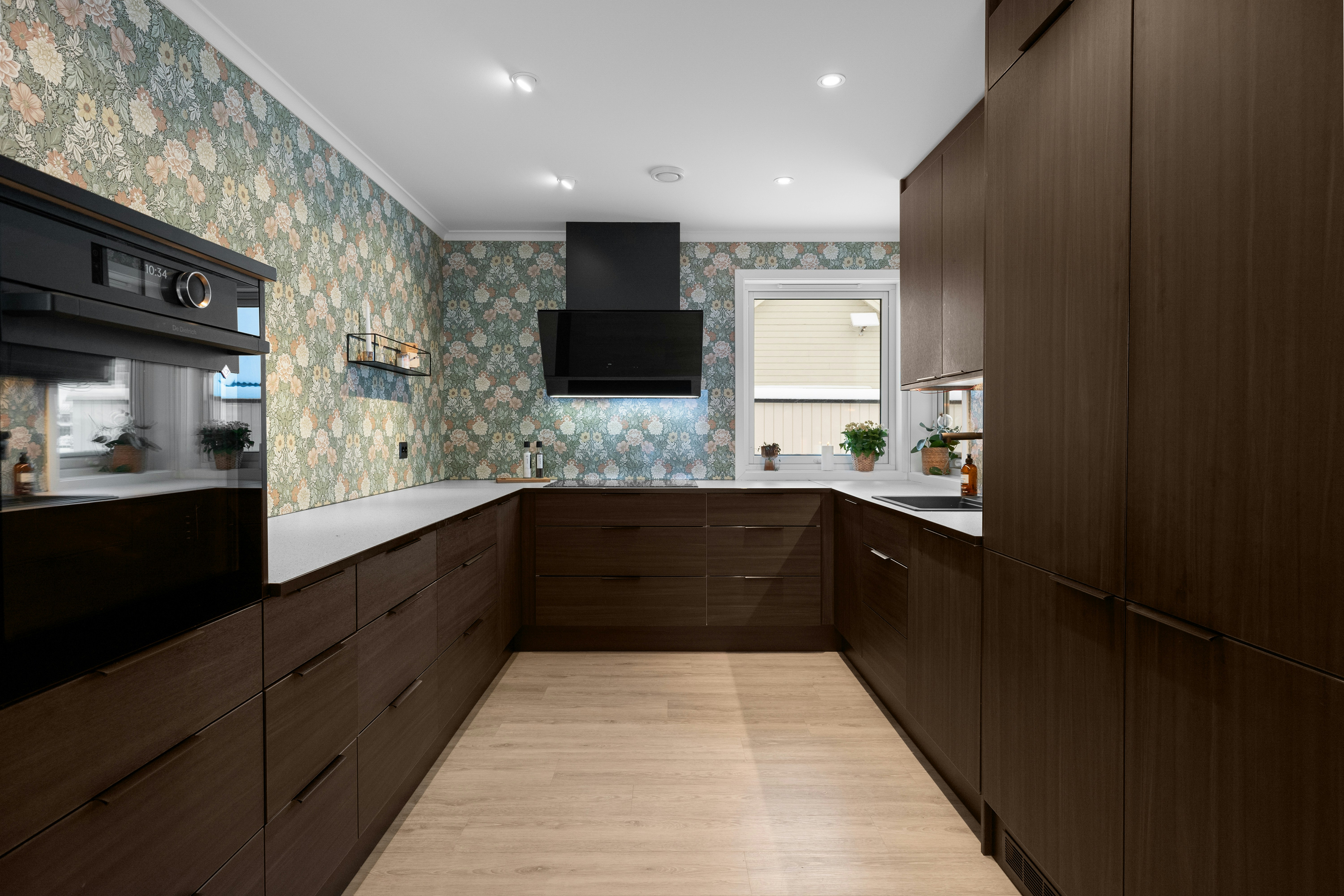 A beautiful, completed kitchen renovation, showcasing the successful realization of a custom kitchen design. - custom kitchen design online