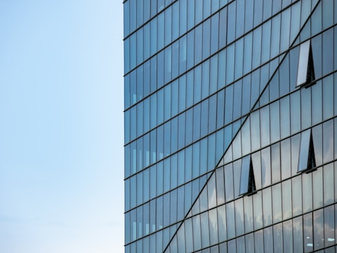A very tall building with a sky in the background