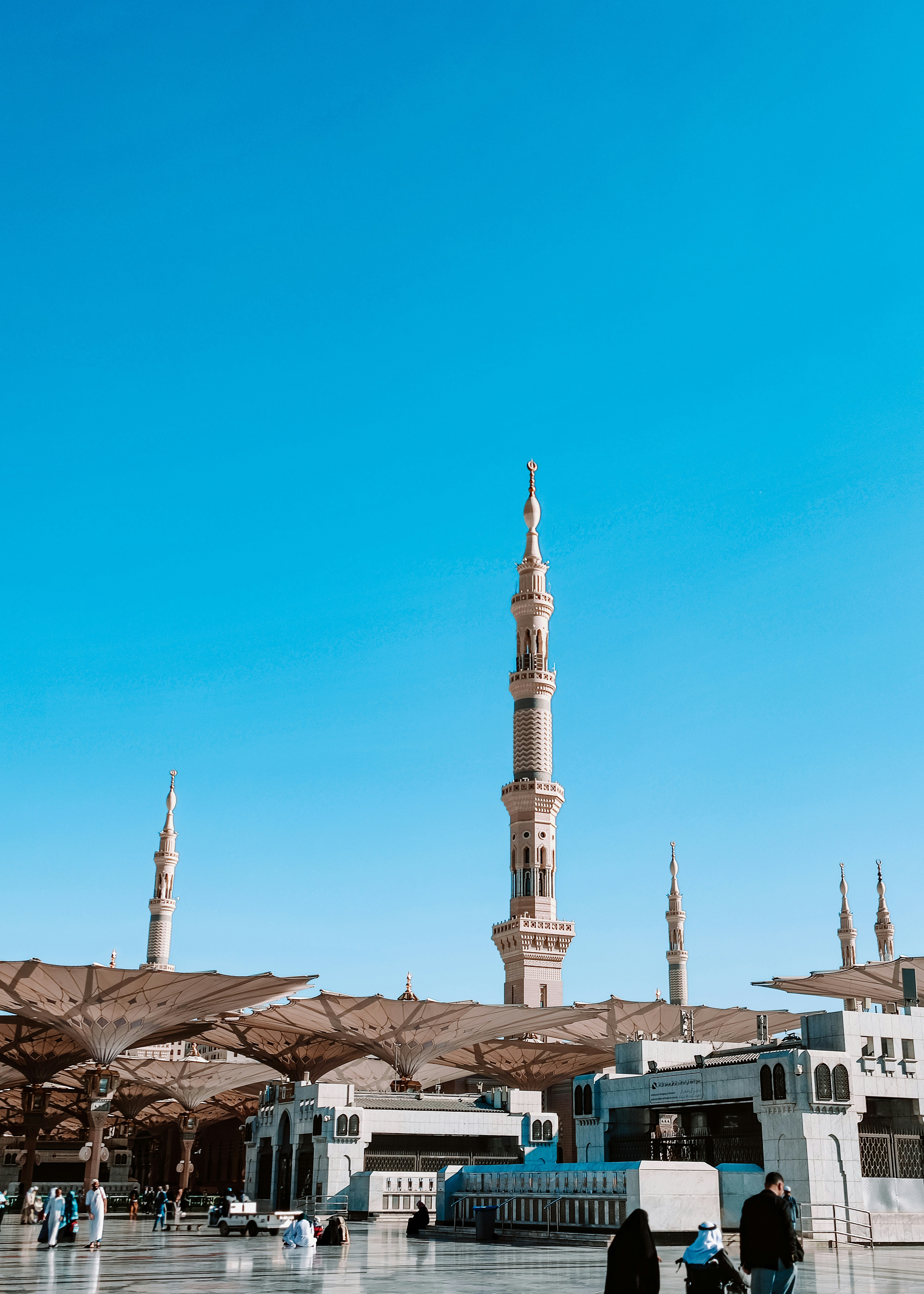 A group of people standing in front of a tall building