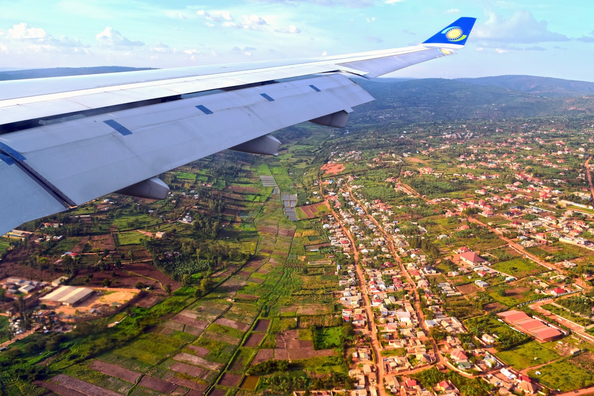 Kigali October — lush green Volcanoes National Park after first short-season rains